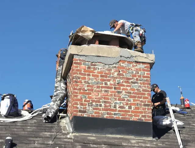 San Gabriel Chimney Sweep installing a custom chimney crown in San Gabriel, CA
